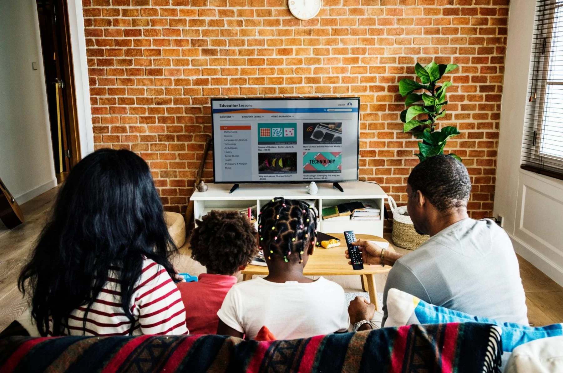 Family sat in front of TV