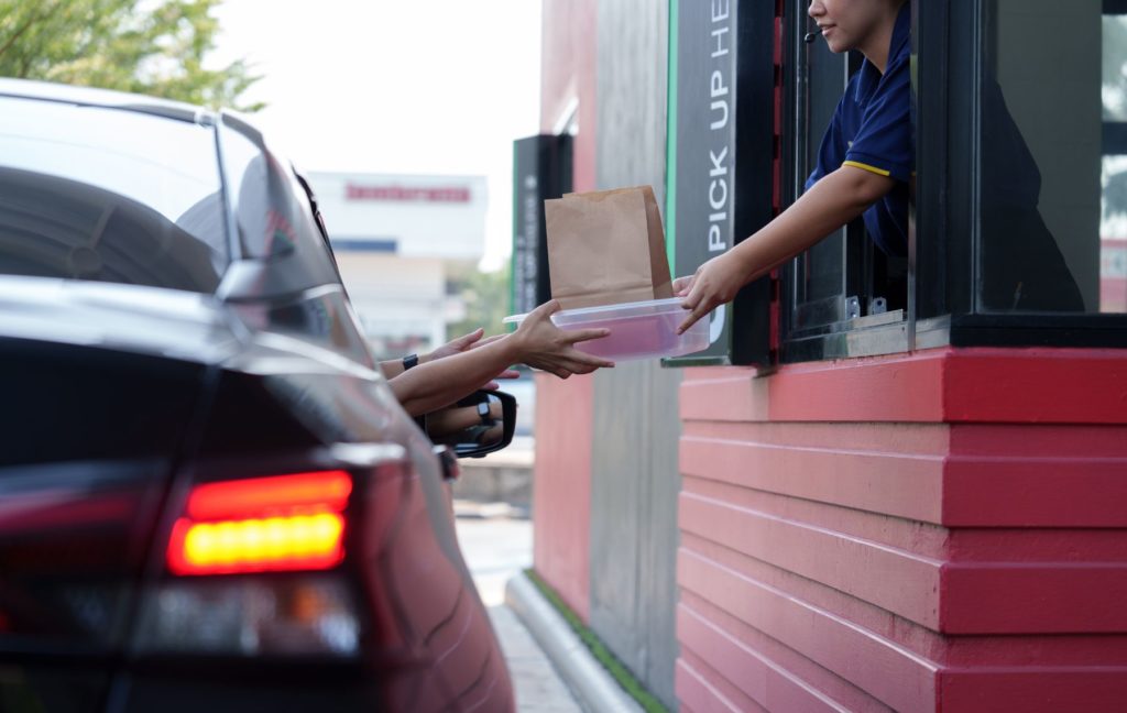 AI Designed for Conversation: Retail Drive Through as the Moment of Truth for Voice Systems