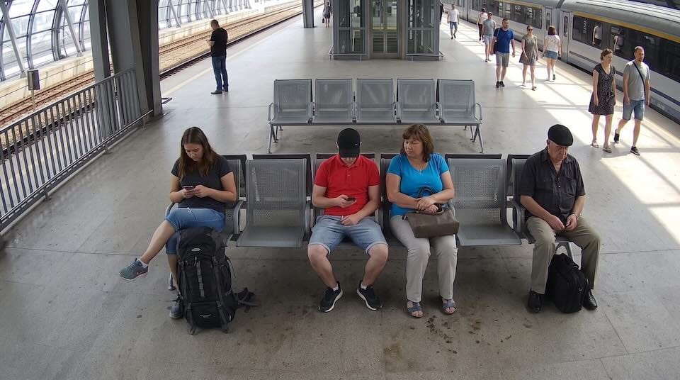 Source input image - People on a train platform